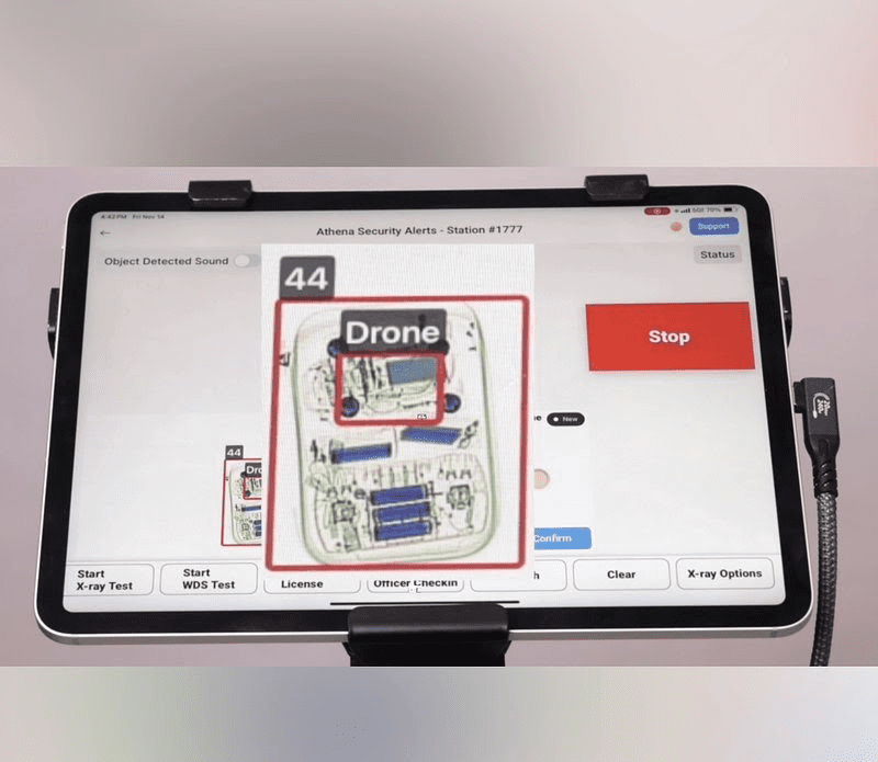 Tablet displaying a drone and computer screen, highlighting AI-powered weapons detection trusted by Duke Health and others.