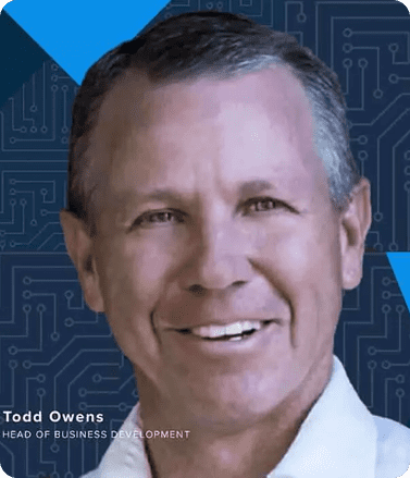 Todd Owen, President of Business Intelligence at Cisco, speaks at a conference, sharing insights on data security and analytics.